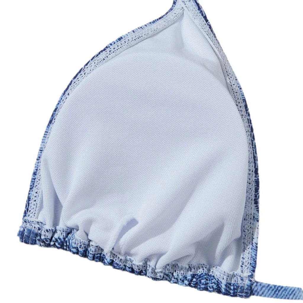 Women's denim blue printed bikini set with adjustable straps, shown as a two-piece swimsuit.
