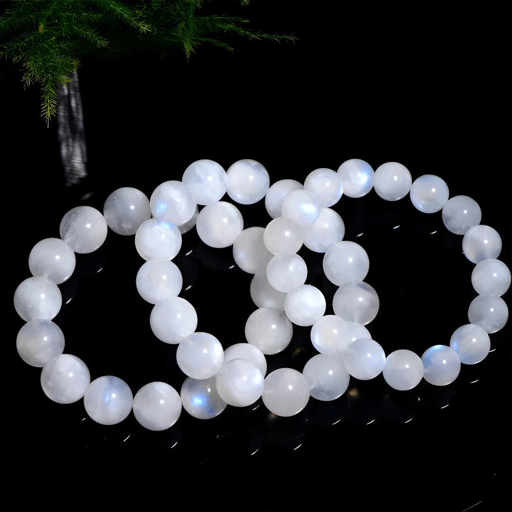 Natural blue moonlight stone round bead bracelet with geometric shapes and polished finish