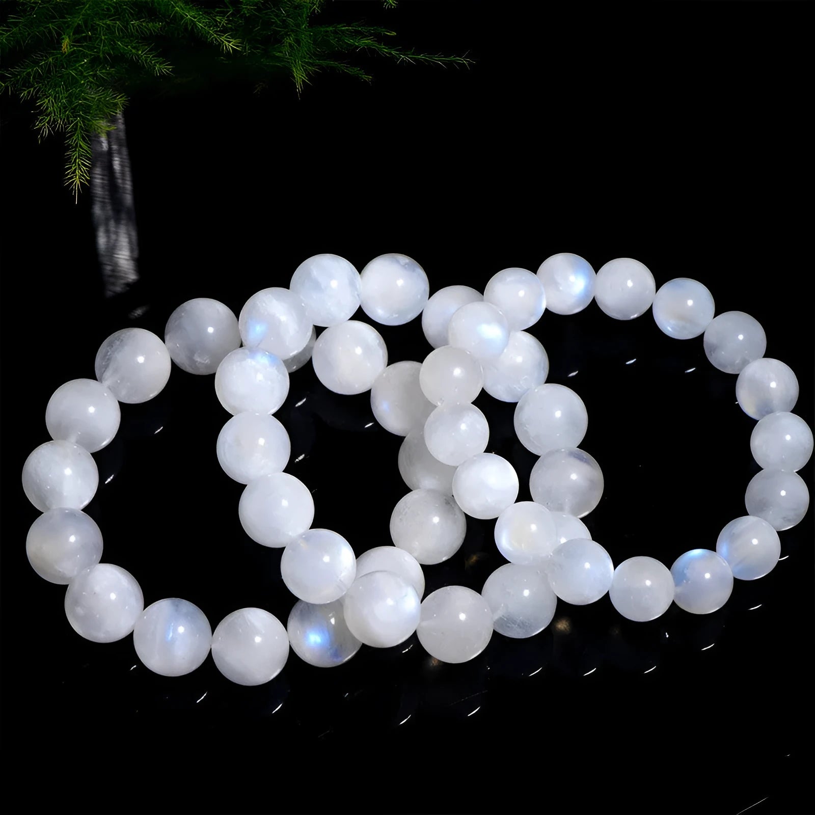 Natural blue moonlight stone round bead bracelet with geometric shapes and polished finish
