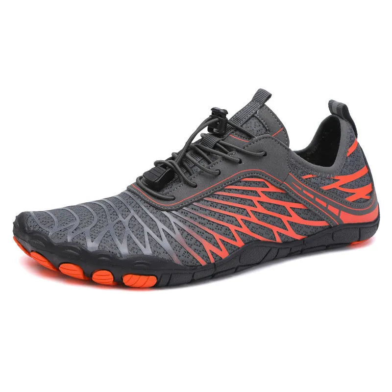 White and black lace-up casual trainers with rubber soles on a plain background