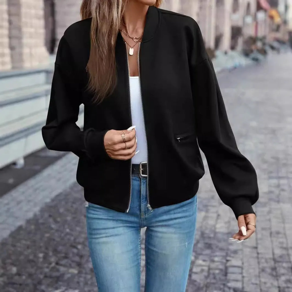 Black women's long sleeve zip jacket with faux pockets, casual style.