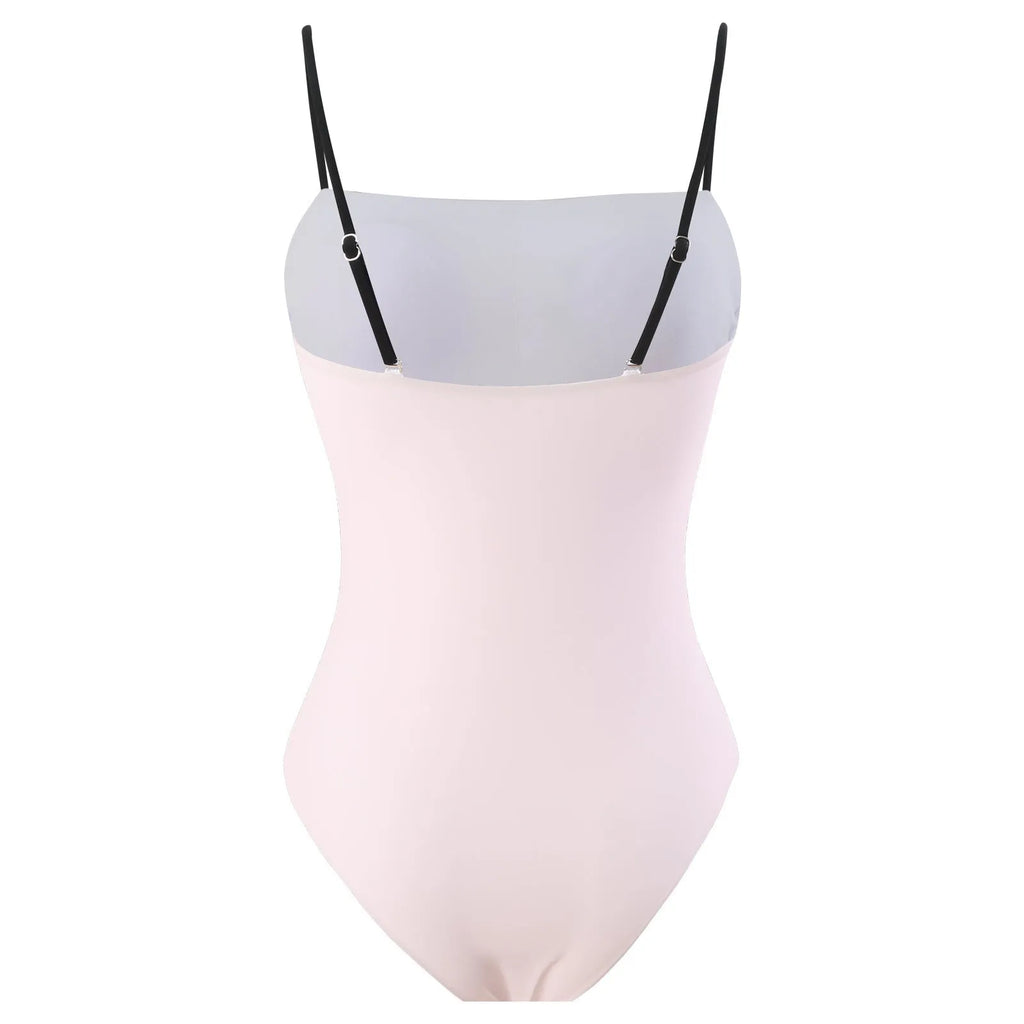 Women's one-piece bikini swimsuit with an attached white tulle skirt.
