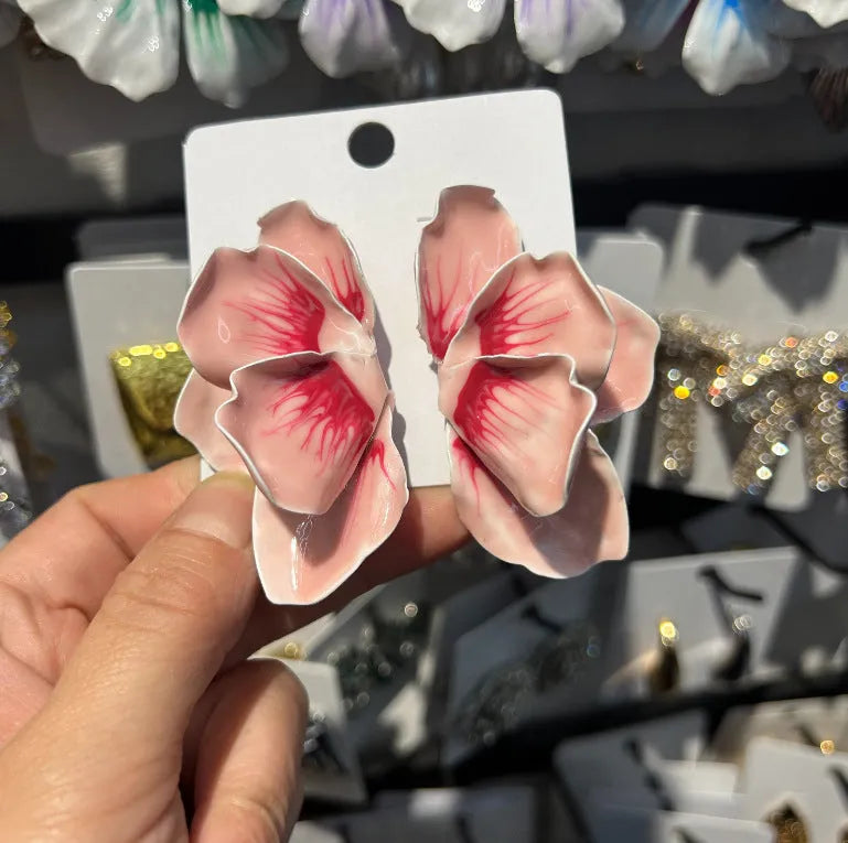 Alloy flower stud earrings with oil-spot glaze finish in blue, green, purple, and rose colour options