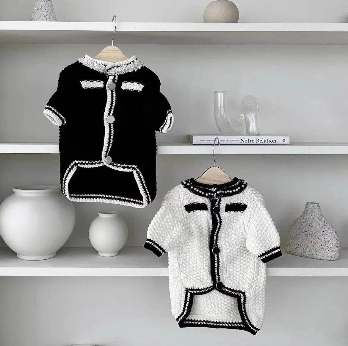 Korean-style white dog sweater with pearl collar on small breed pet