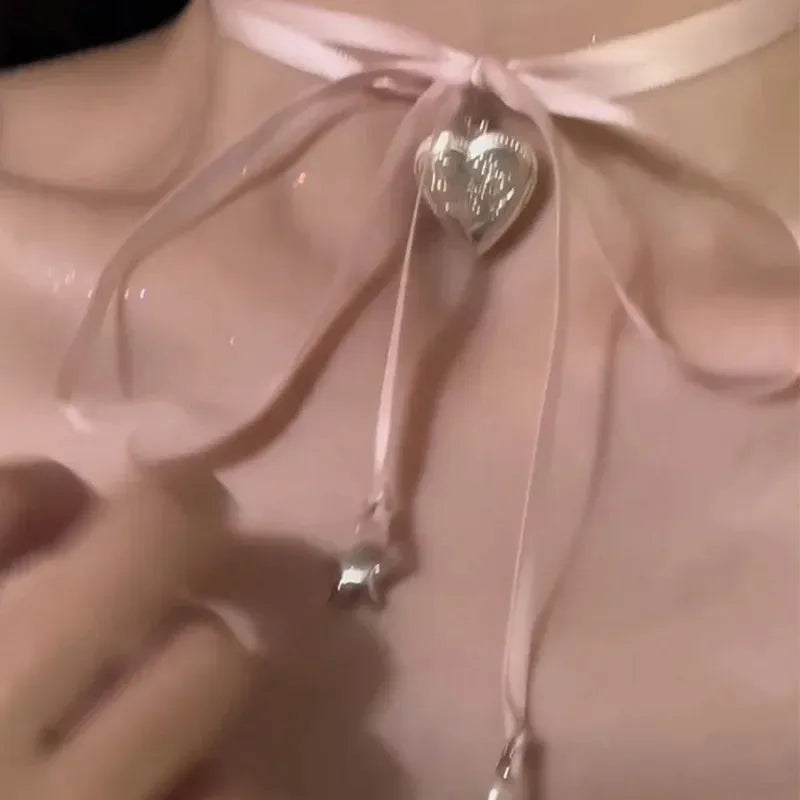 Women's alloy ribbon love pendant necklace on clavicle chain available in 33 colours