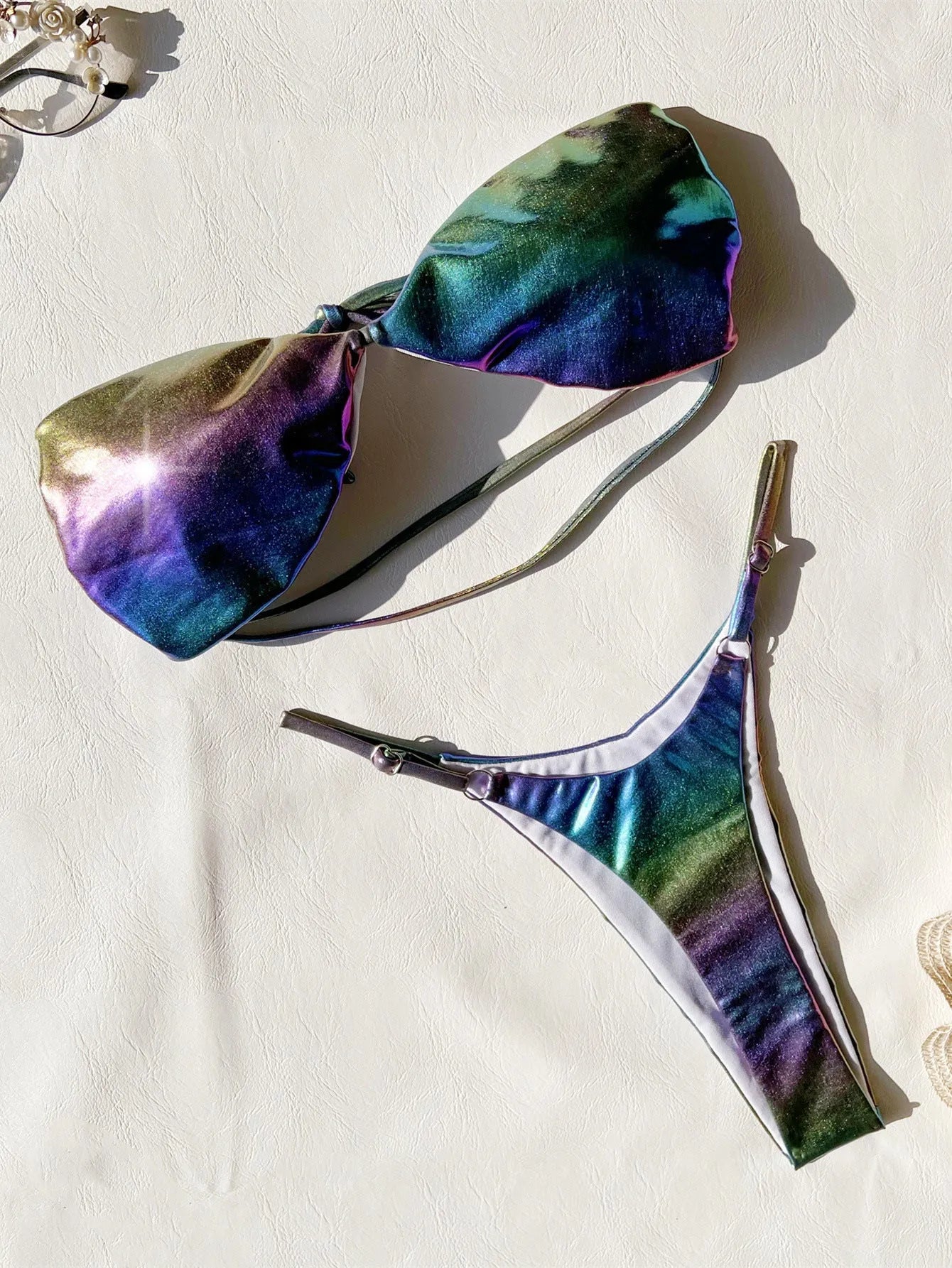 Women's gradient purple bikini set showing colour transition on two-piece swimwear