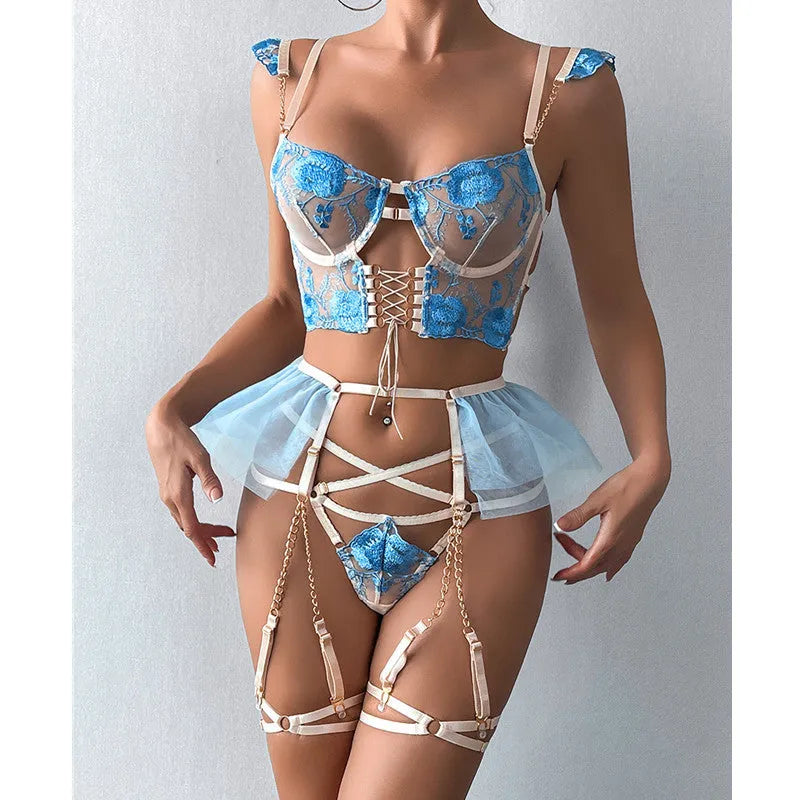 Light blue embroidered lace push-up bra and matching pants set on a mannequin.