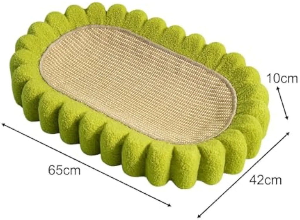 Green oval cat scratcher pad and bed made from sisal, measuring 65cm long.
