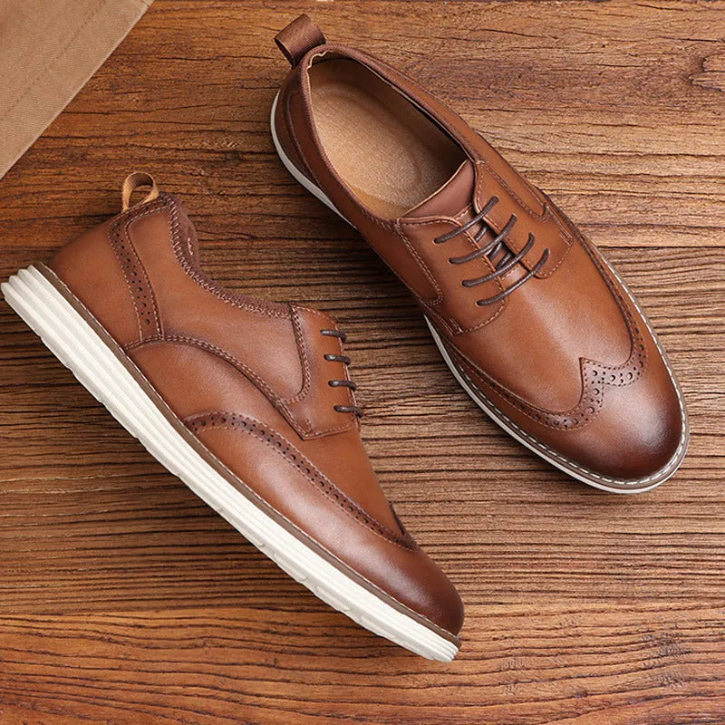 Men's black and brown slip-on business casual shoes with PU upper and carved detailing