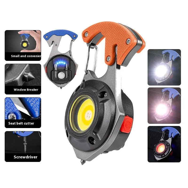 Compact silver and black multifunction keychain torch with window breaker tip and seven LED light modes.