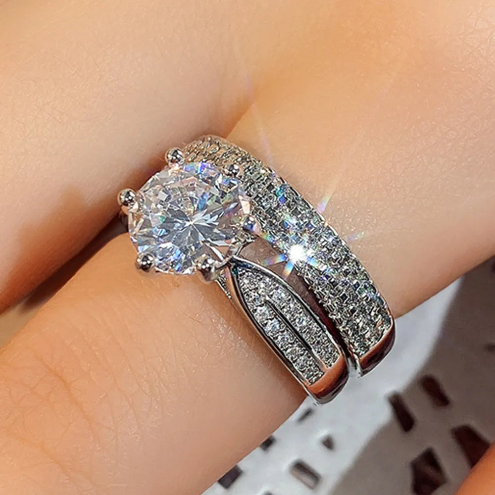 Alloy wedding ring with white gold colour finish showing geometry design and round elements