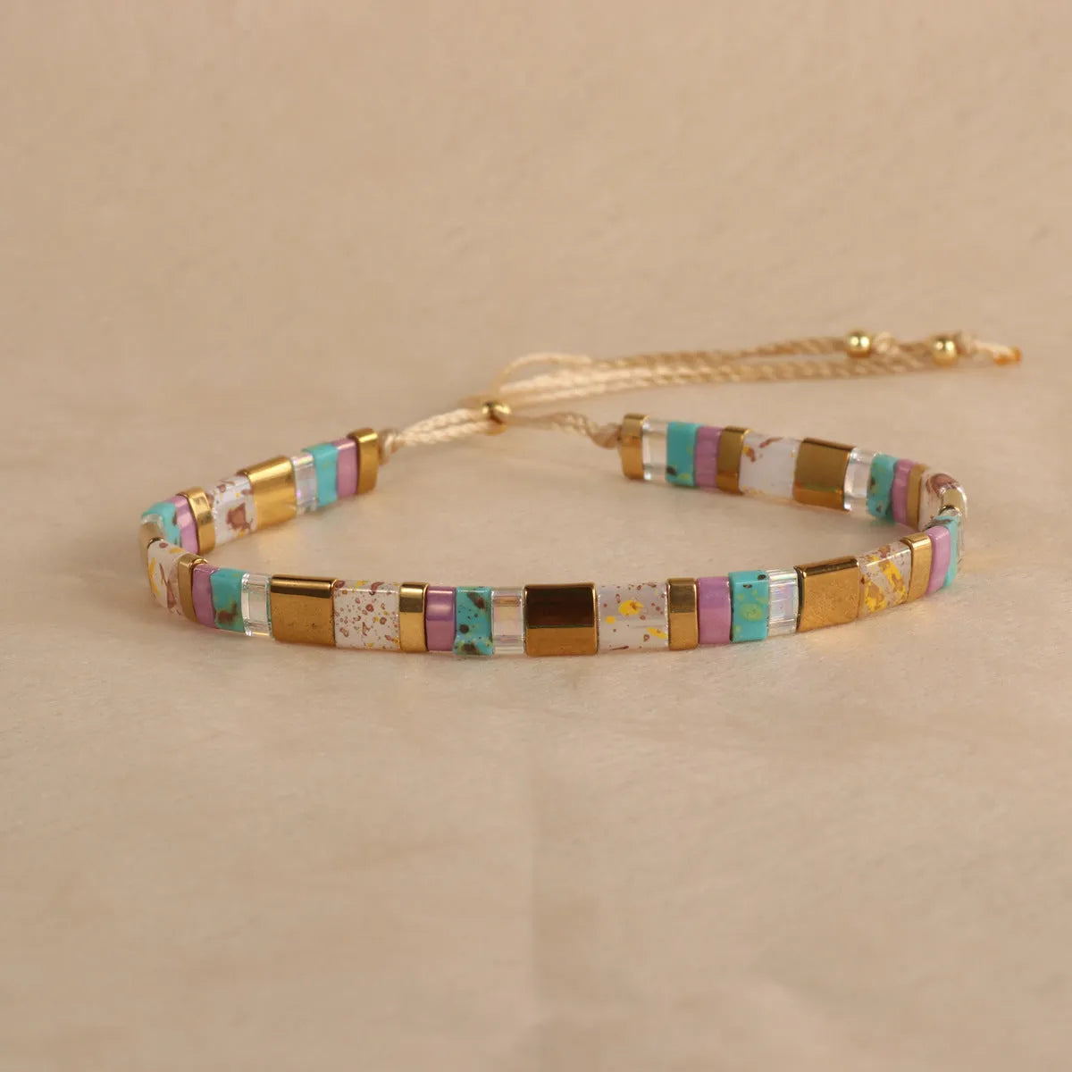 Geometric glass beaded bracelet in European styling with round beads and five colour options