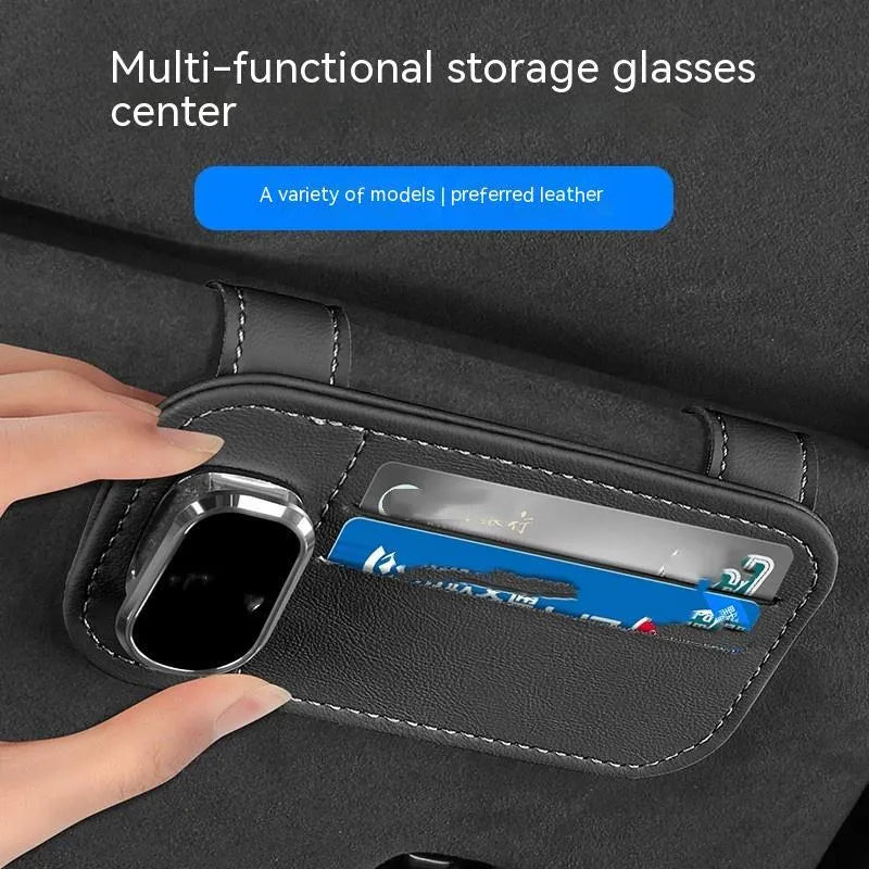 Cowhide leather car sun visor holder with card slots and integrated sunglasses clip.