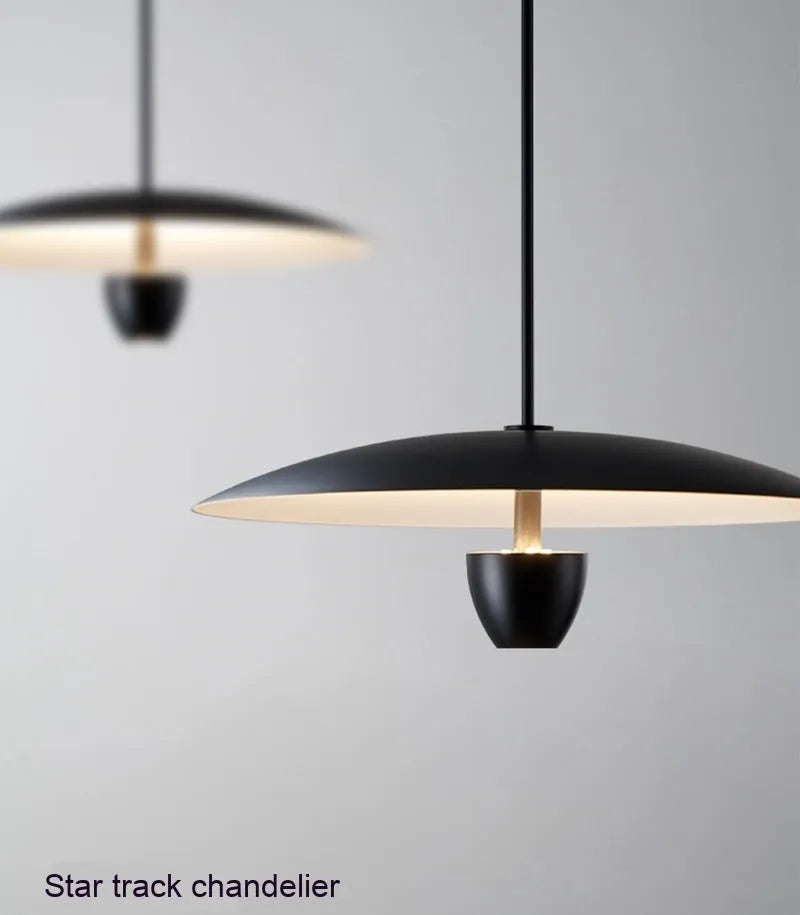 Black modern minimalist Nordic chandelier with warm light illumination