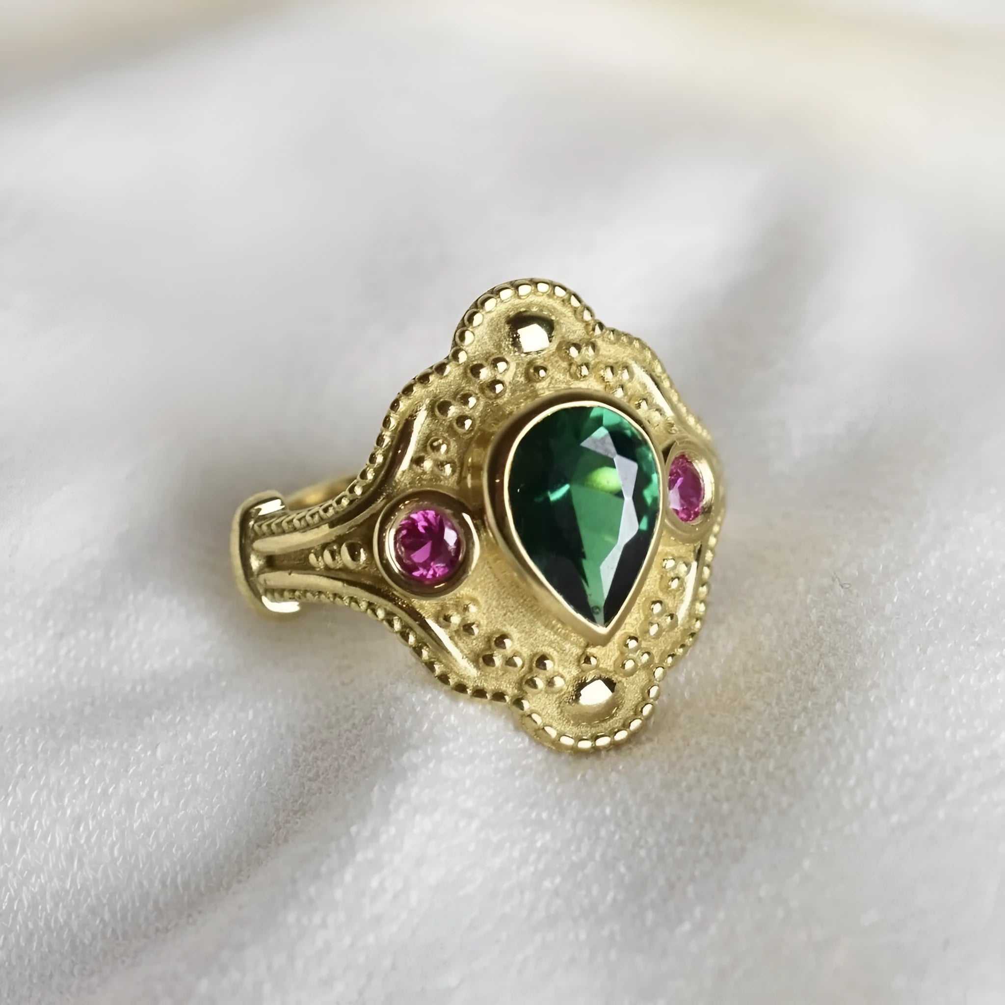 Golden geometric women's fashion ring on a plain background, showing its gold-plated alloy construction and ins style design.
