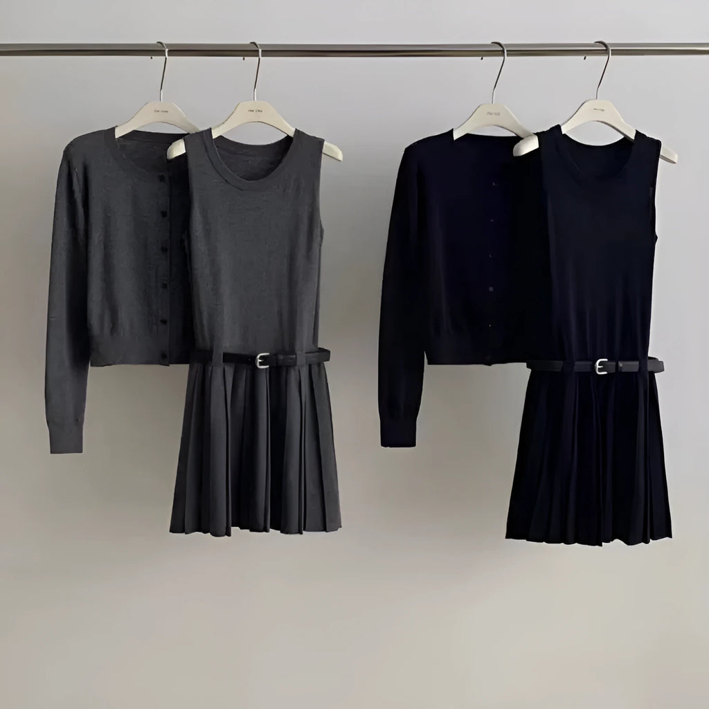 Women's grey Art Retro knitted vest skirt and long-sleeved cardigan two-piece set with pleated detail.