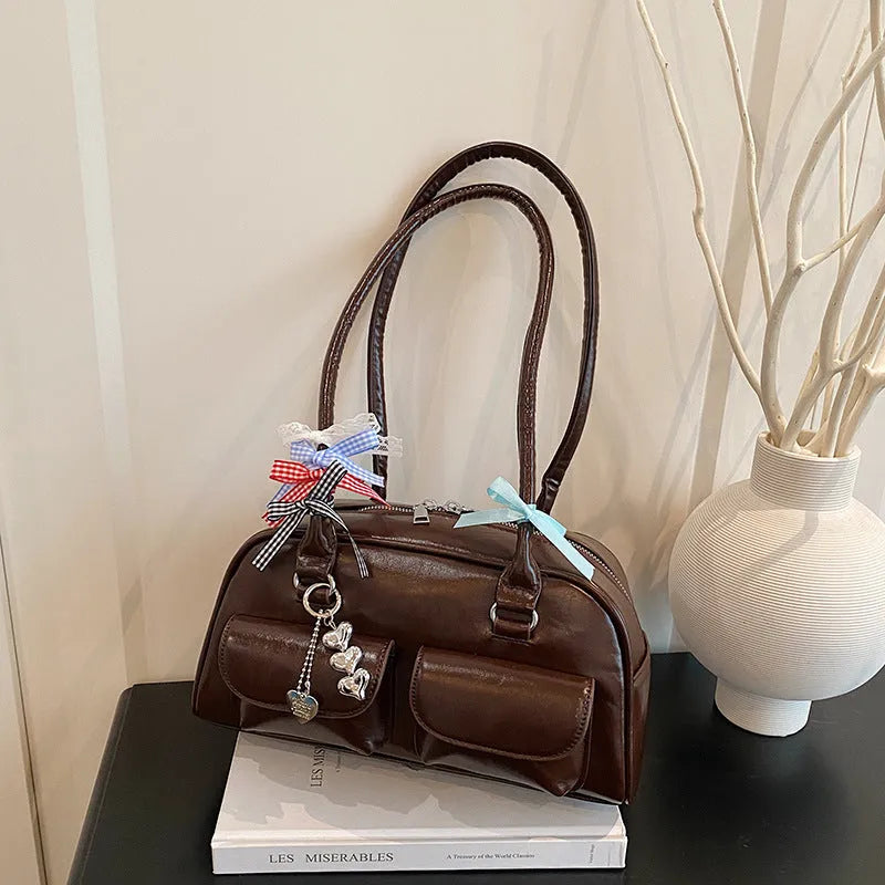 Women's black PU leather retro pillow shoulder bag with double strap and flap closure
