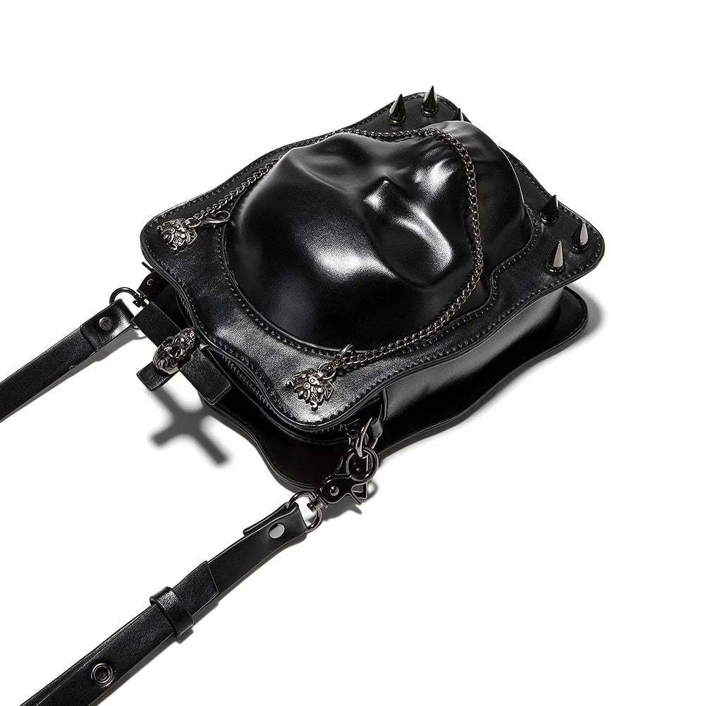 Black mini square crossbody bag with Halloween skull design, chain strap, and Gothic stitching details