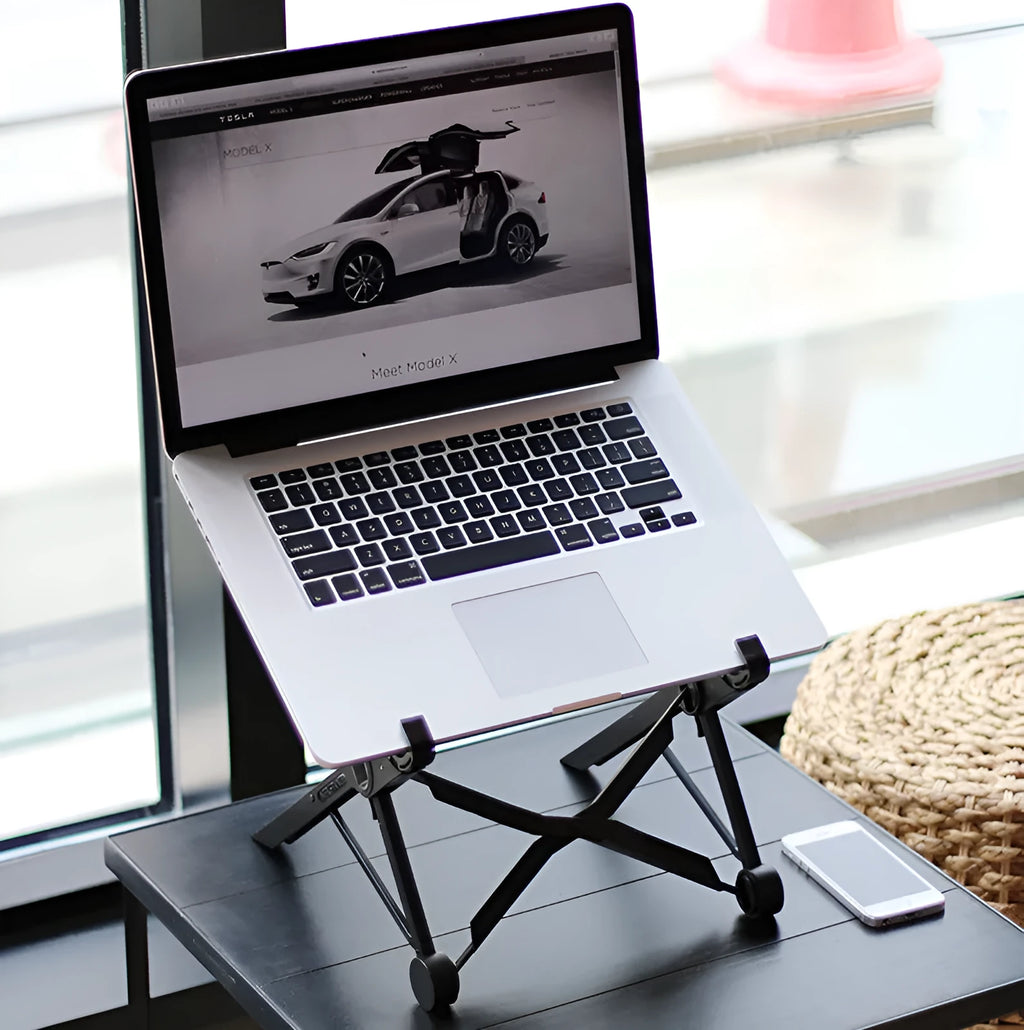 Black folding portable laptop stand with adjustable height, shown folded to 35.4cm size.
