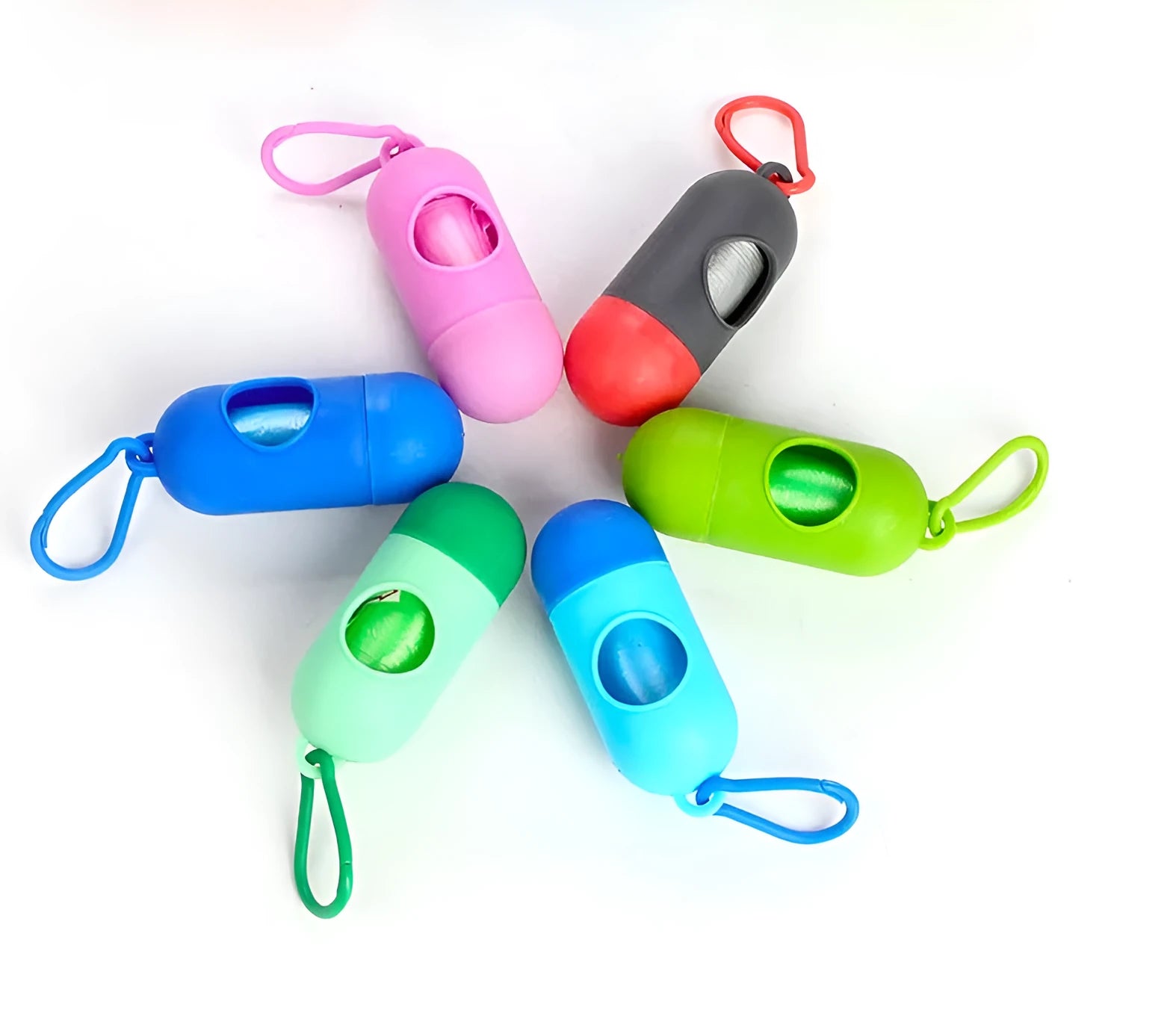 Roll of coloured dog poop bags showing size of 22.5 by 30 centimetres.