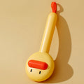 Small yellow duck-shaped pet comb with needle teeth for cat and dog grooming