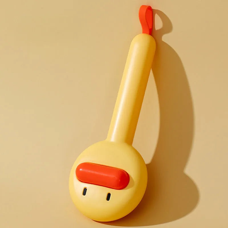 Small yellow duck-shaped pet comb with needle teeth for cat and dog grooming
