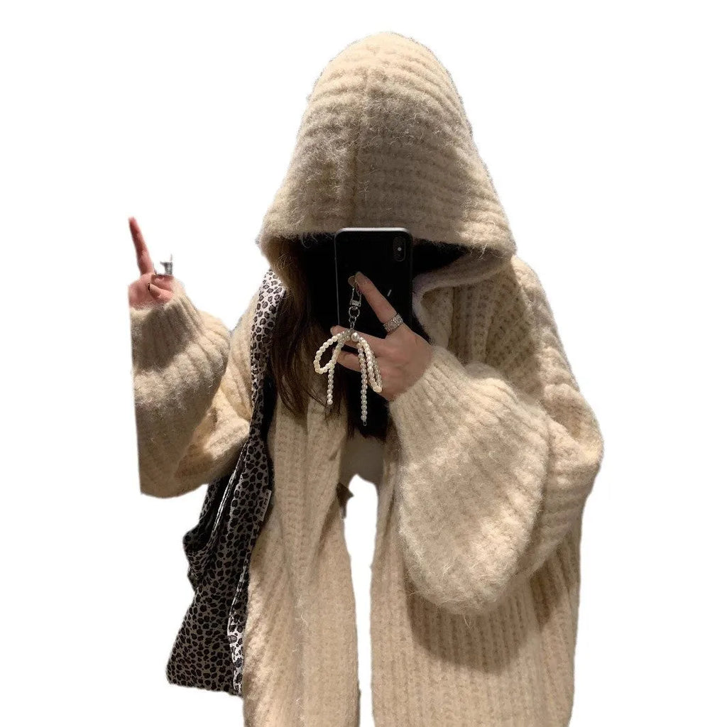 Brown women's loose-fit hooded acrylic sweater cardigan with retro style on a hanger.
