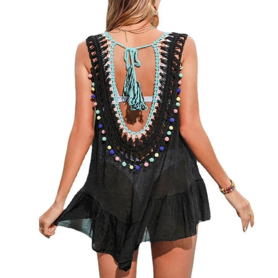 Black women's crochet beach cover-up with cut-out ruffle design for swimming