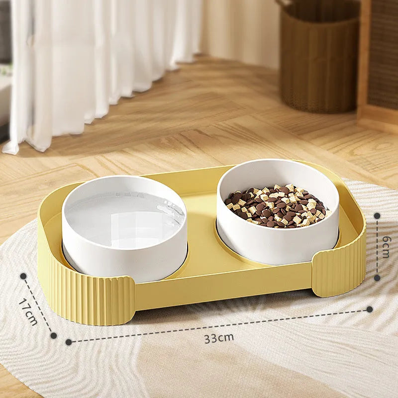 Green ceramic elevated cat bowl set with 15-degree tilt and non-slip base