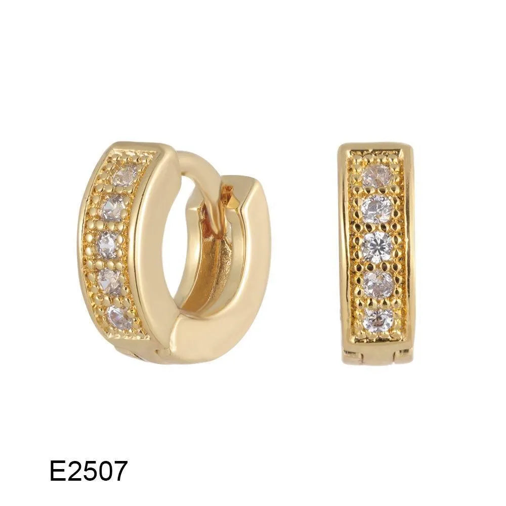 A pair of heart-shaped clip earrings with a single zircon stone in electroplated brass gold.