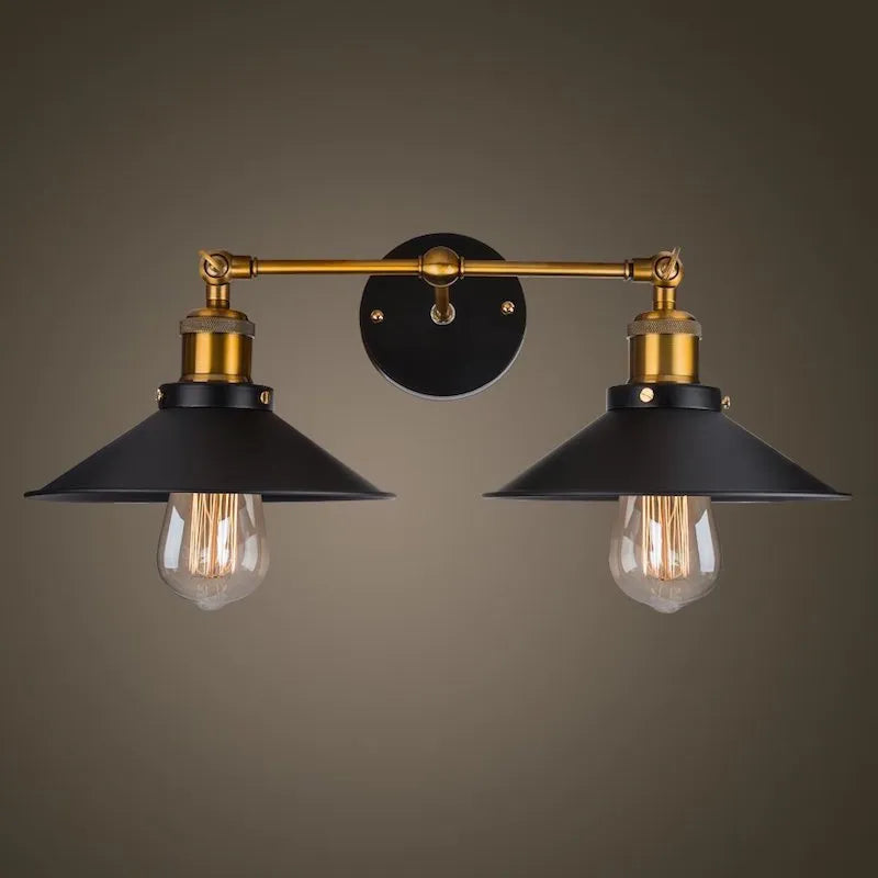 Black iron retro industrial style wall lamp with two adjustable light heads.
