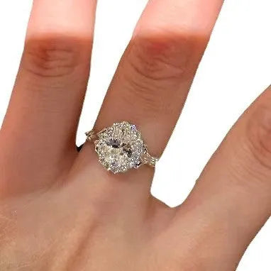 Silver geometric ring with bridal bouquet diamond design and adjustable opening