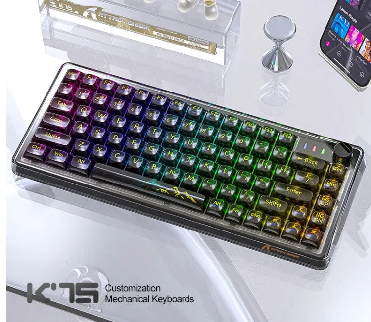 Attack Shark K75RGB wireless mechanical keyboard with transparent black case showing RGB backlighting