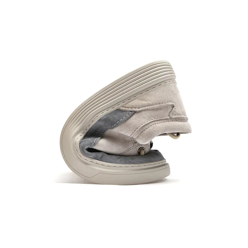Men's grey casual leather skate shoes with round toe and lace-up front.