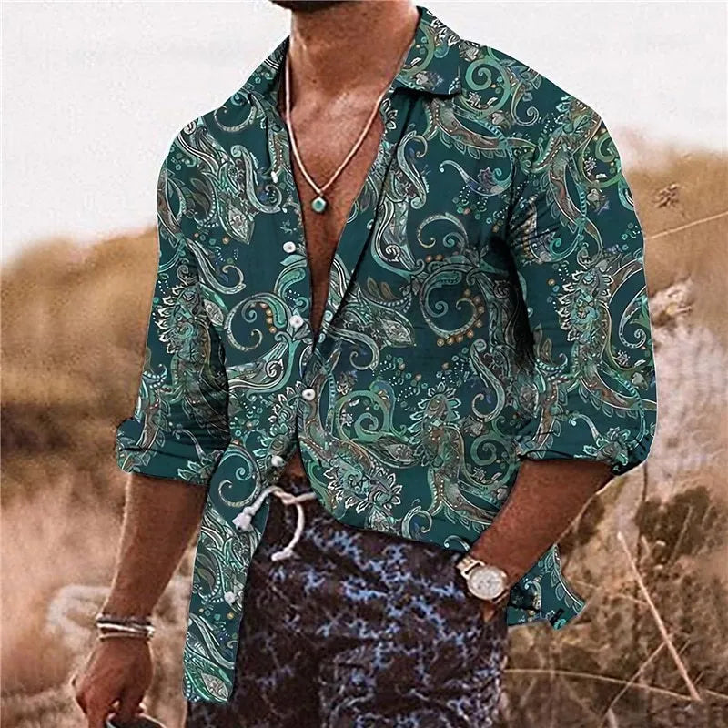 Man wearing a loose-fit long sleeve shirt with a colourful bohemian floral 3D print pattern.