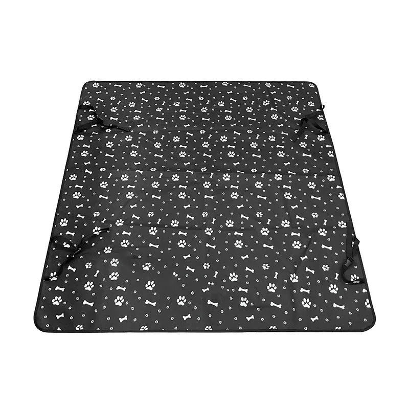 Grey cloth car pet mat with dog bone print protecting a car rear seat