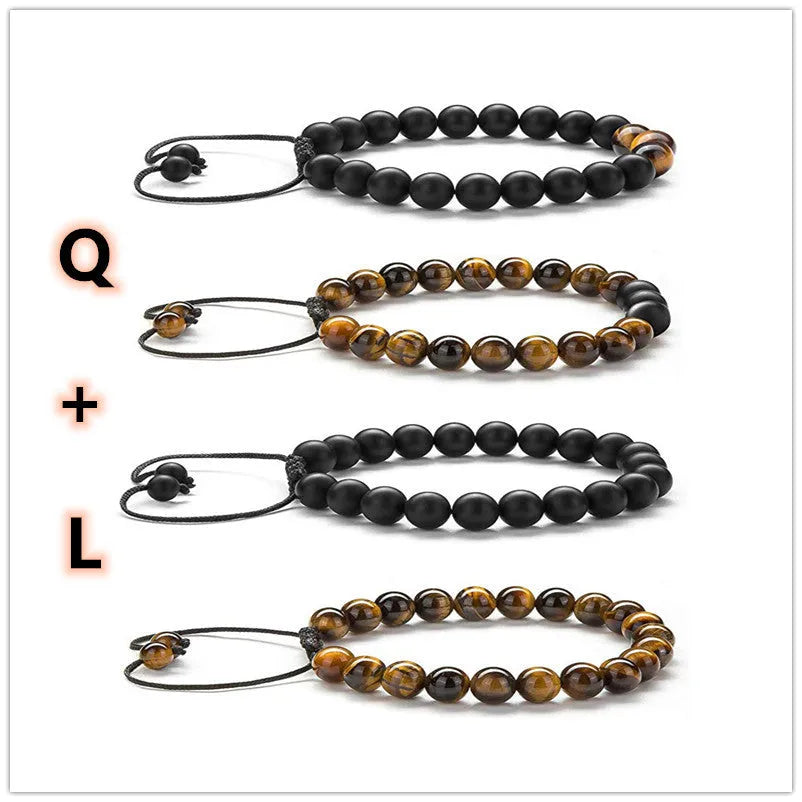 Matte black agate tiger eye bead couple bracelets with geometric design on a neutral background.