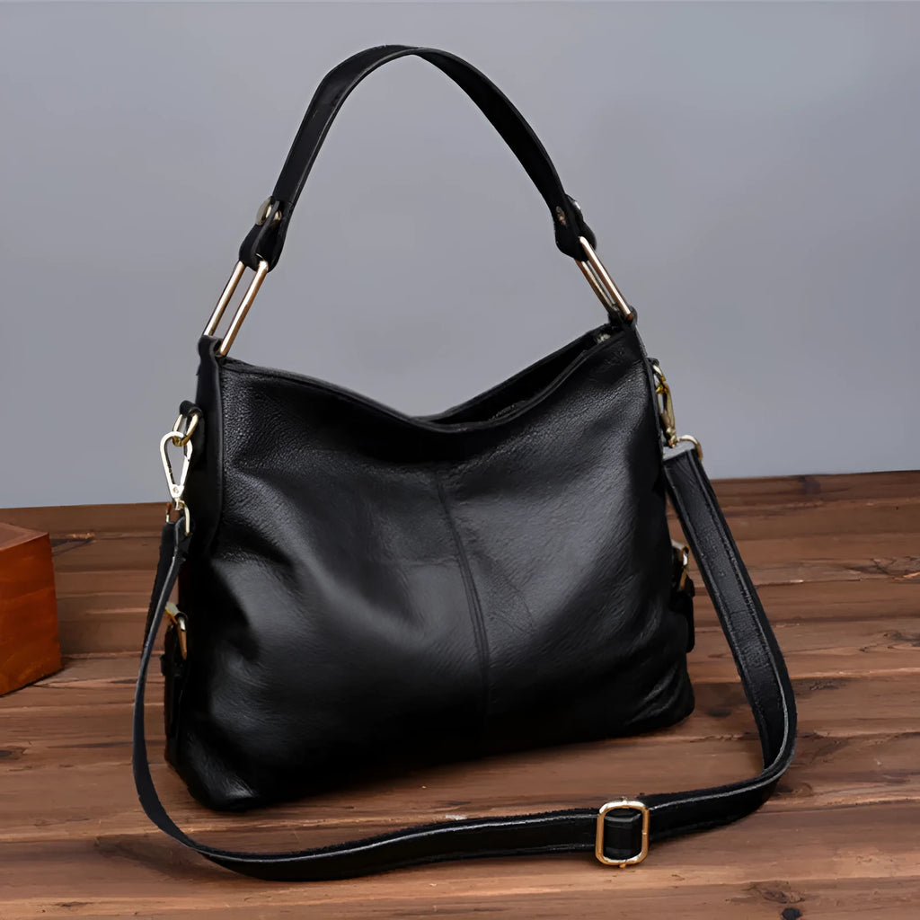 Genuine leather crossbody bag in vertical square silhouette with internal organisation compartments