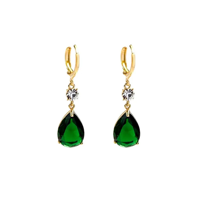 A pair of emerald green geometric teardrop earrings made from alloy.