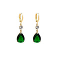 A pair of emerald green geometric teardrop earrings made from alloy.