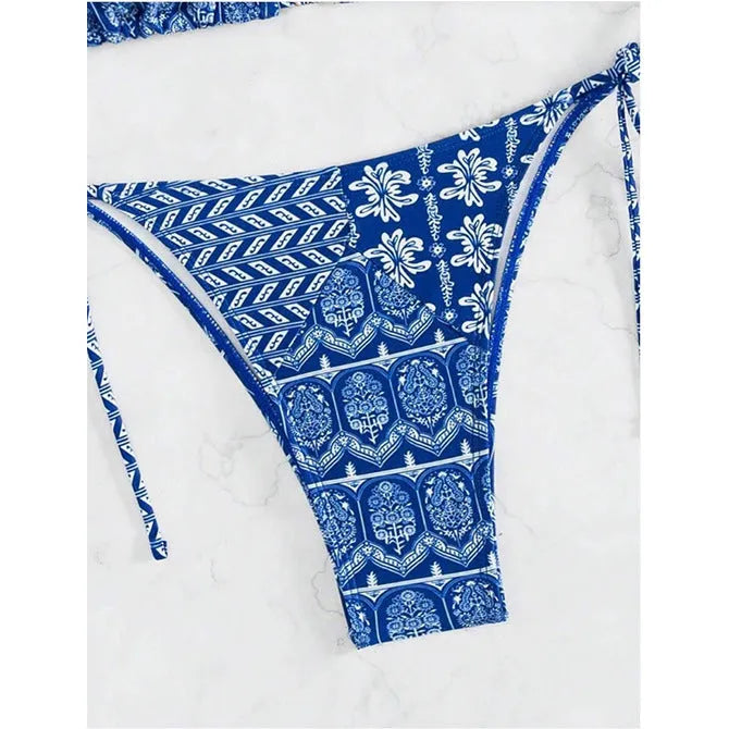 Women's green split bikini swimsuit with bandage stitching detail on the top and briefs.