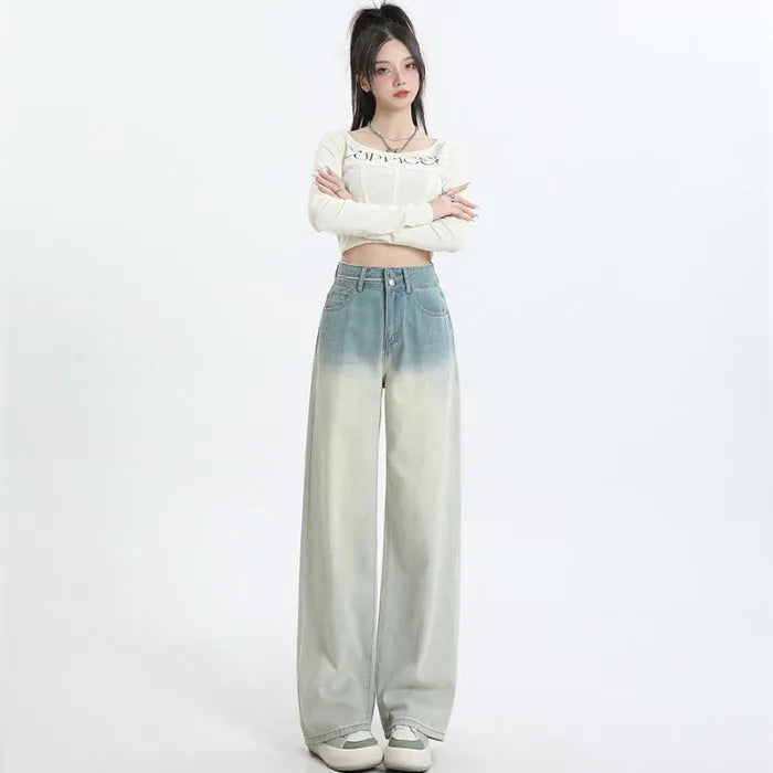 Women's gradient blue straight-leg denim trousers showing wide-leg design