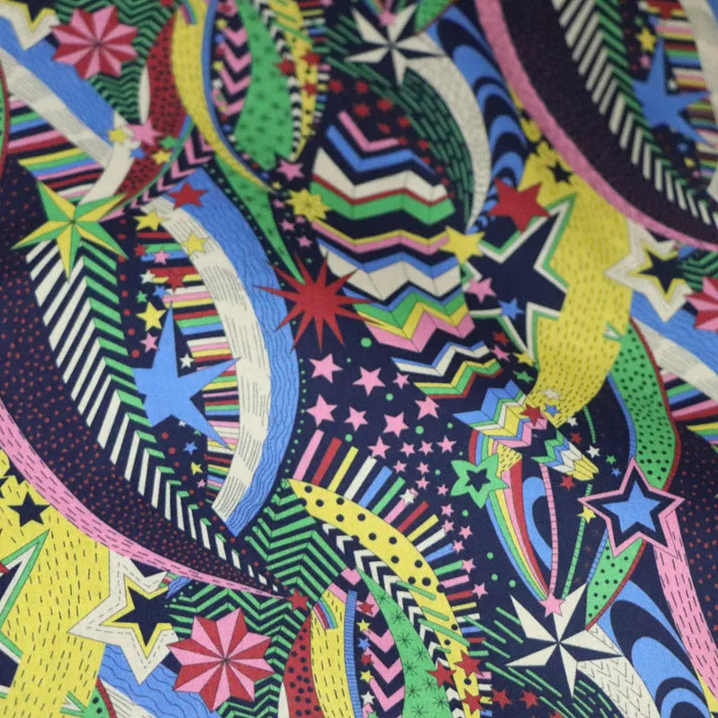 Blue digital printed cotton fabric with floral design measuring 145cm wide