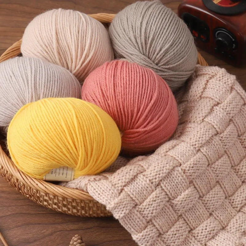 Roll of woolen hand knitting yarn for baby garments in various colours