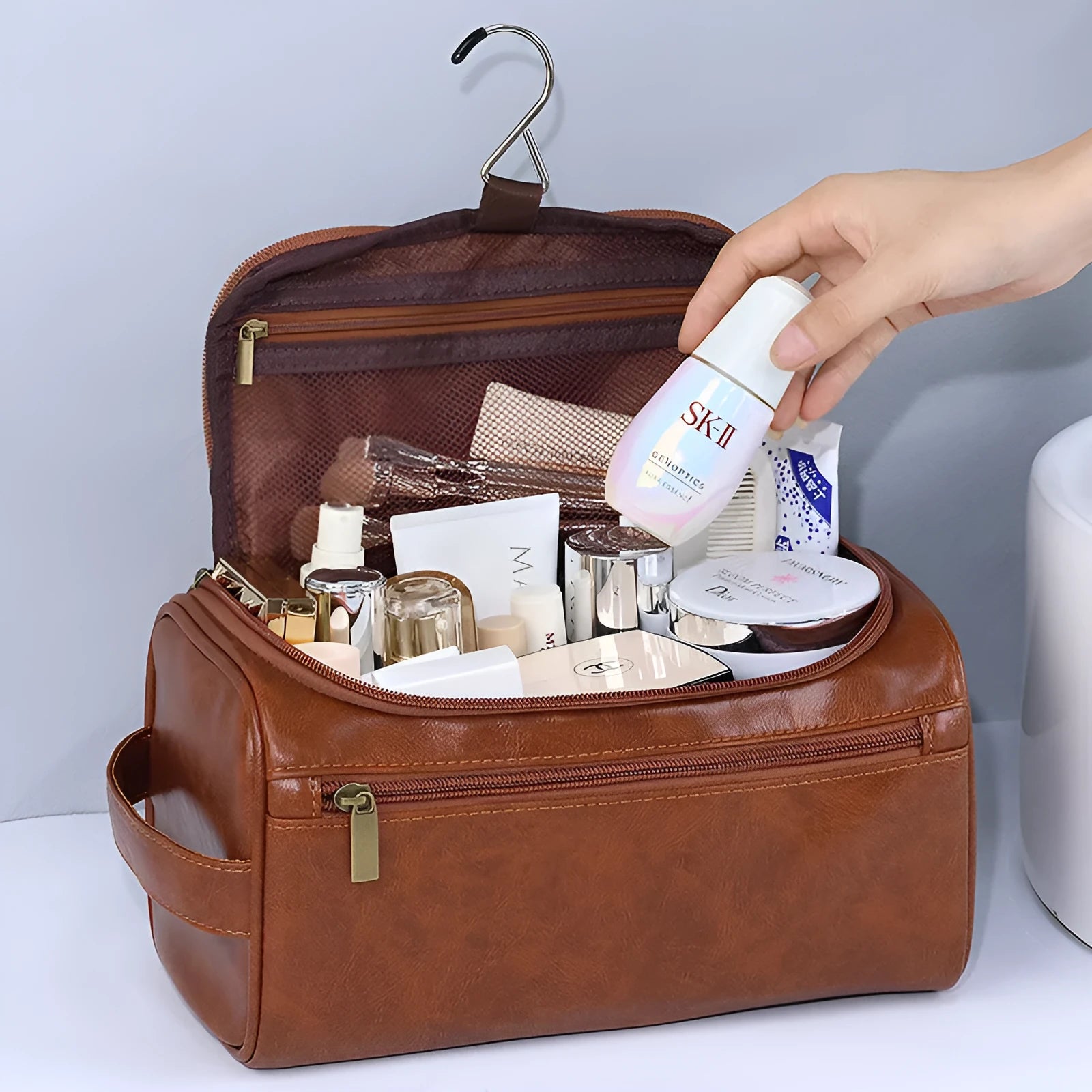 Large capacity waterproof cosmetic bag in PU leather or Oxford cloth, shown in beige colour.