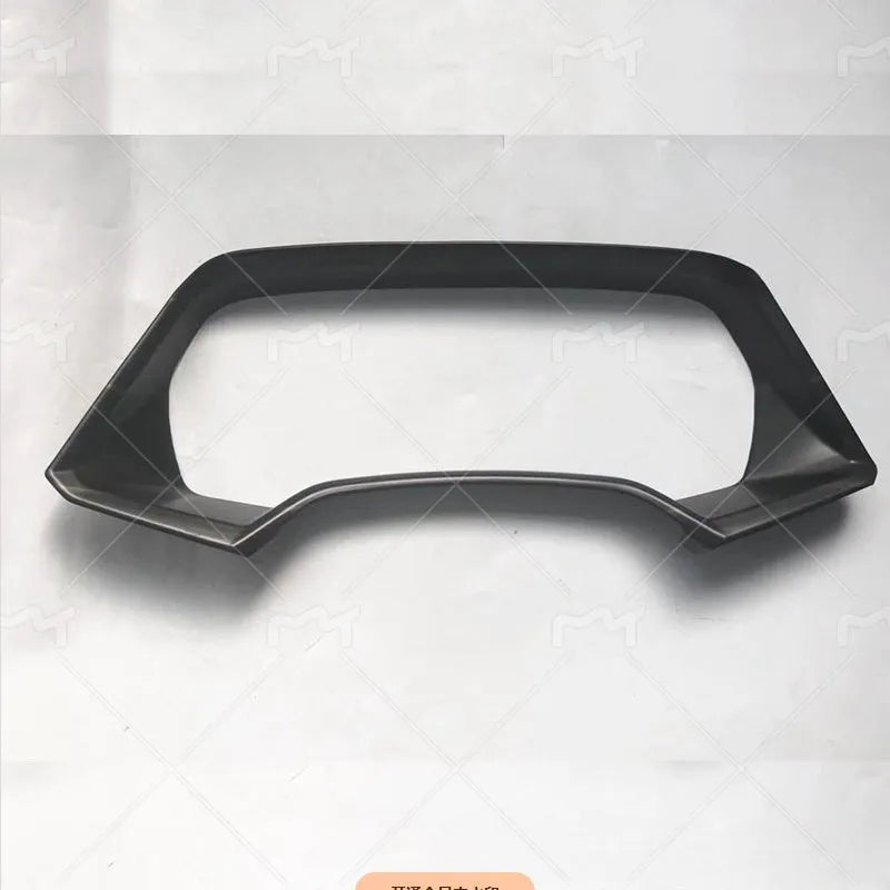 BMW X5L dashboard decorative frame in carbon fibre or peach wood finish
