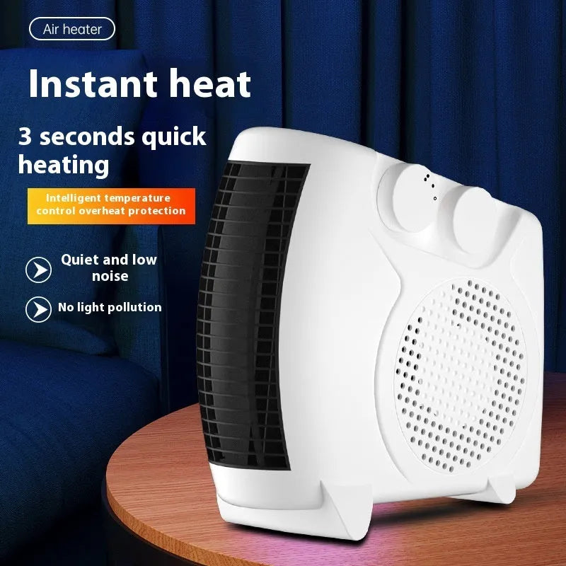 Small white desktop electric heater with control dial and grille, shown from the front.