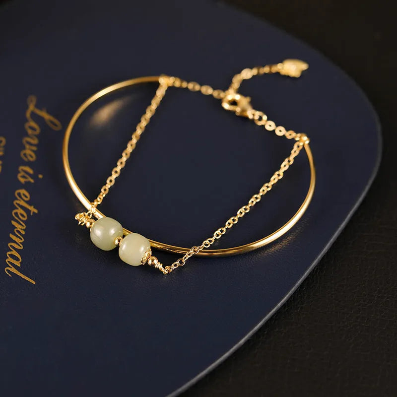 Jade lucky beads bracelet for women with gold inlay, shown in single, double, and three bead versions.