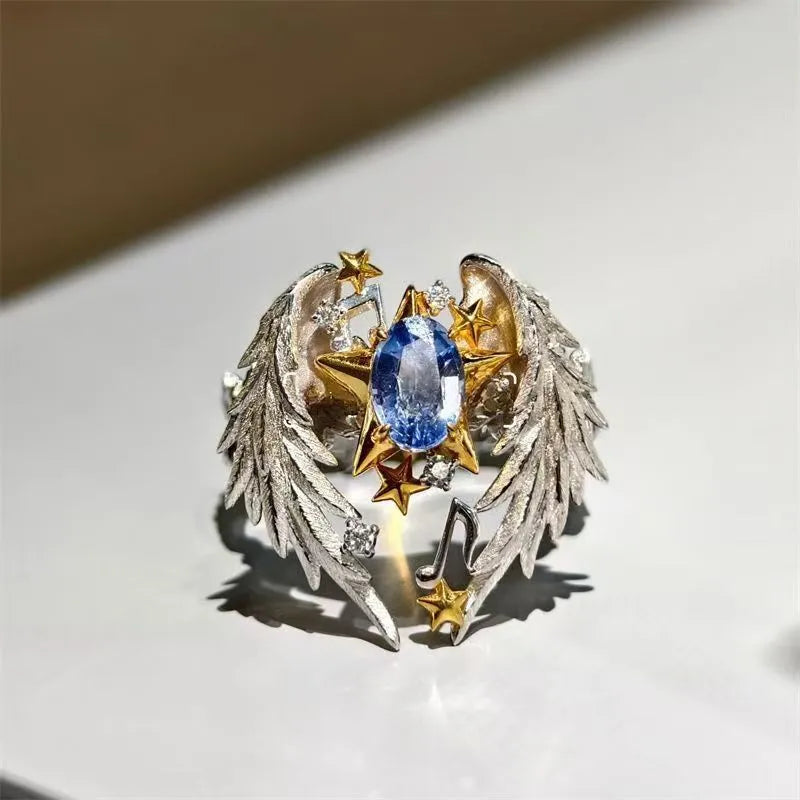 Adjustable geometric angel wings ring in alloy with open mouth design