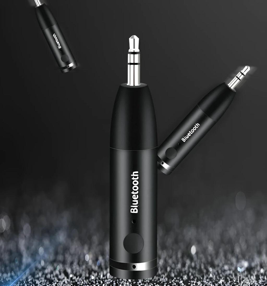 Black Bluetooth audio receiver with 3.5mm jack and USB charging port for car stereo connection